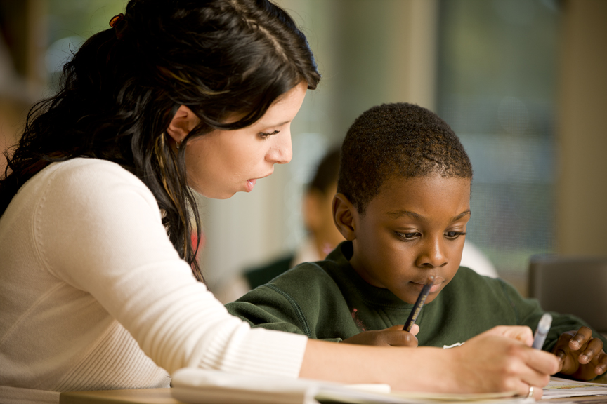 Faculty member helping student